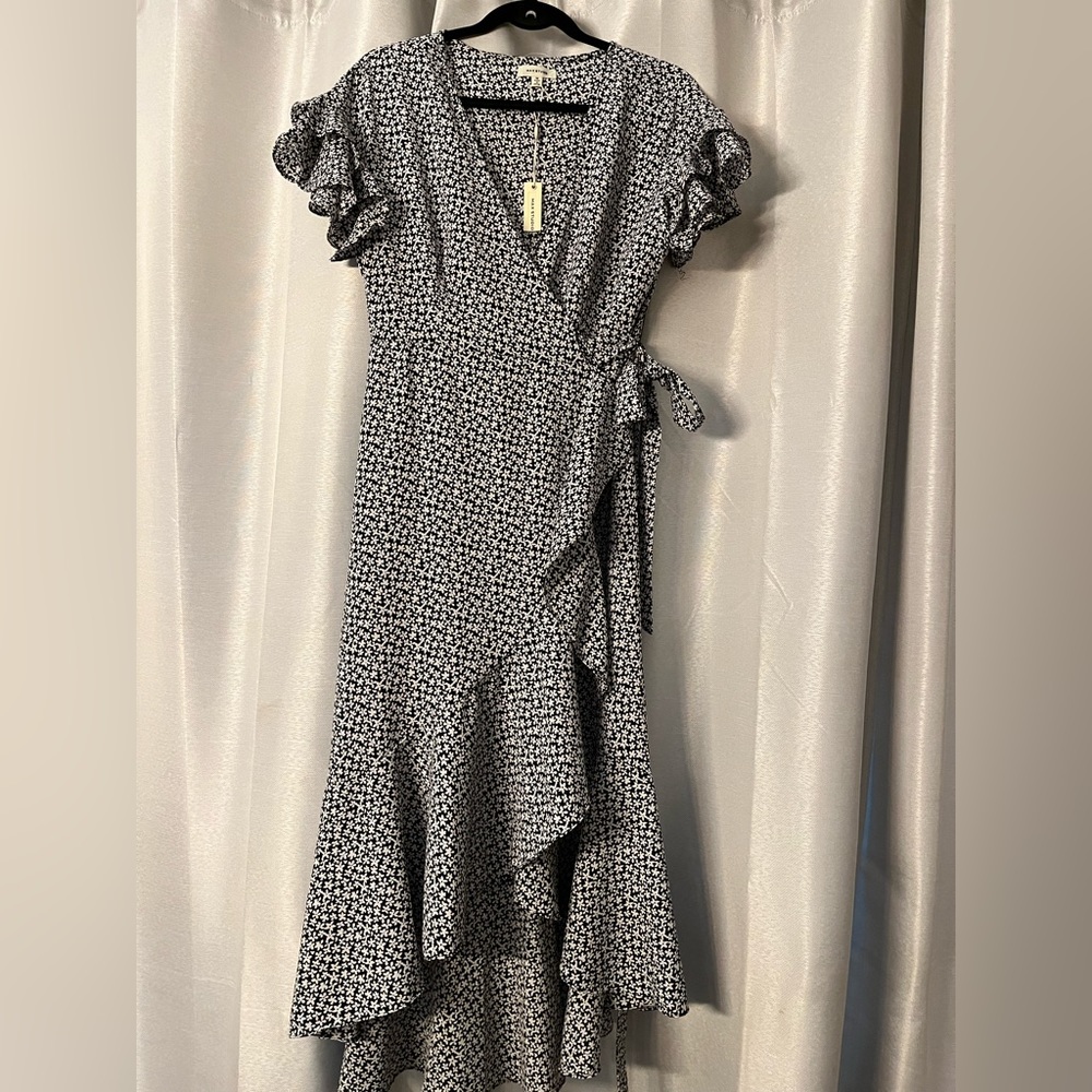 Max Studio black and white floral wrap dress. Very sexy and comfy.
